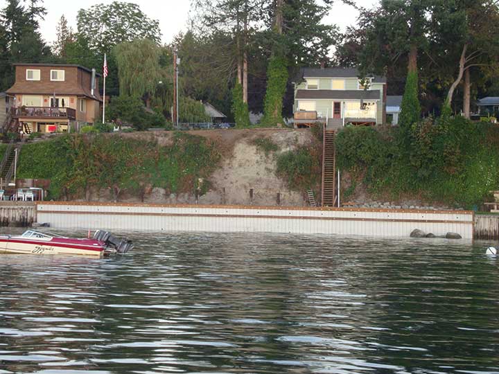 Cold ice lake wall Washington using Truline seawall system Truline seawall lake wall Washington