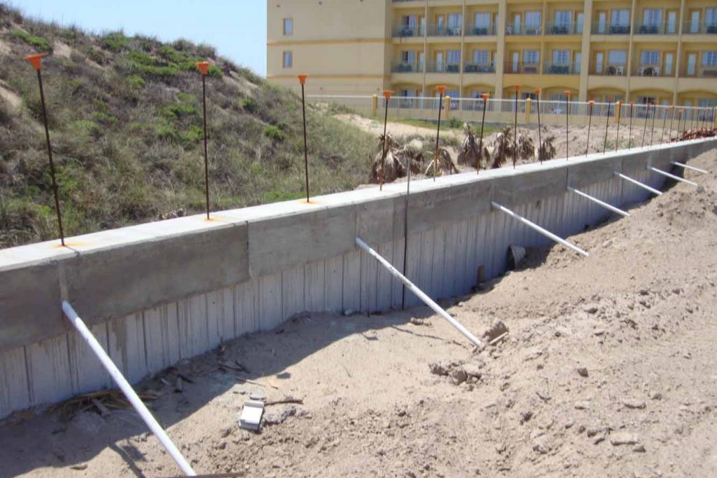 Barrier Retaining Wall in Texas with ConcreteFill Sheet Pile System
