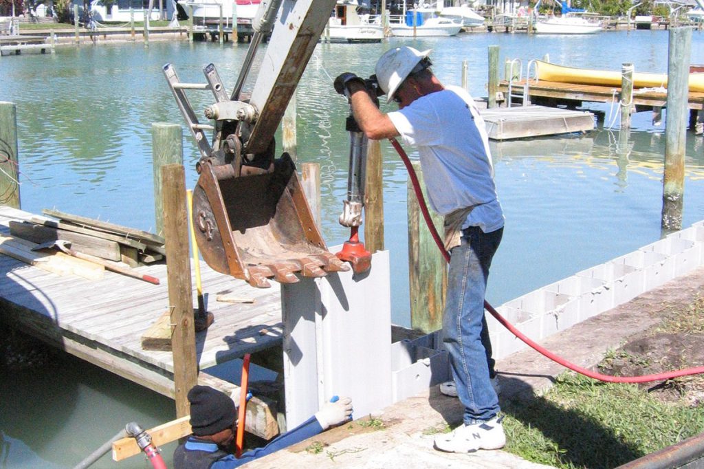 Truline seawall construction jack hammer